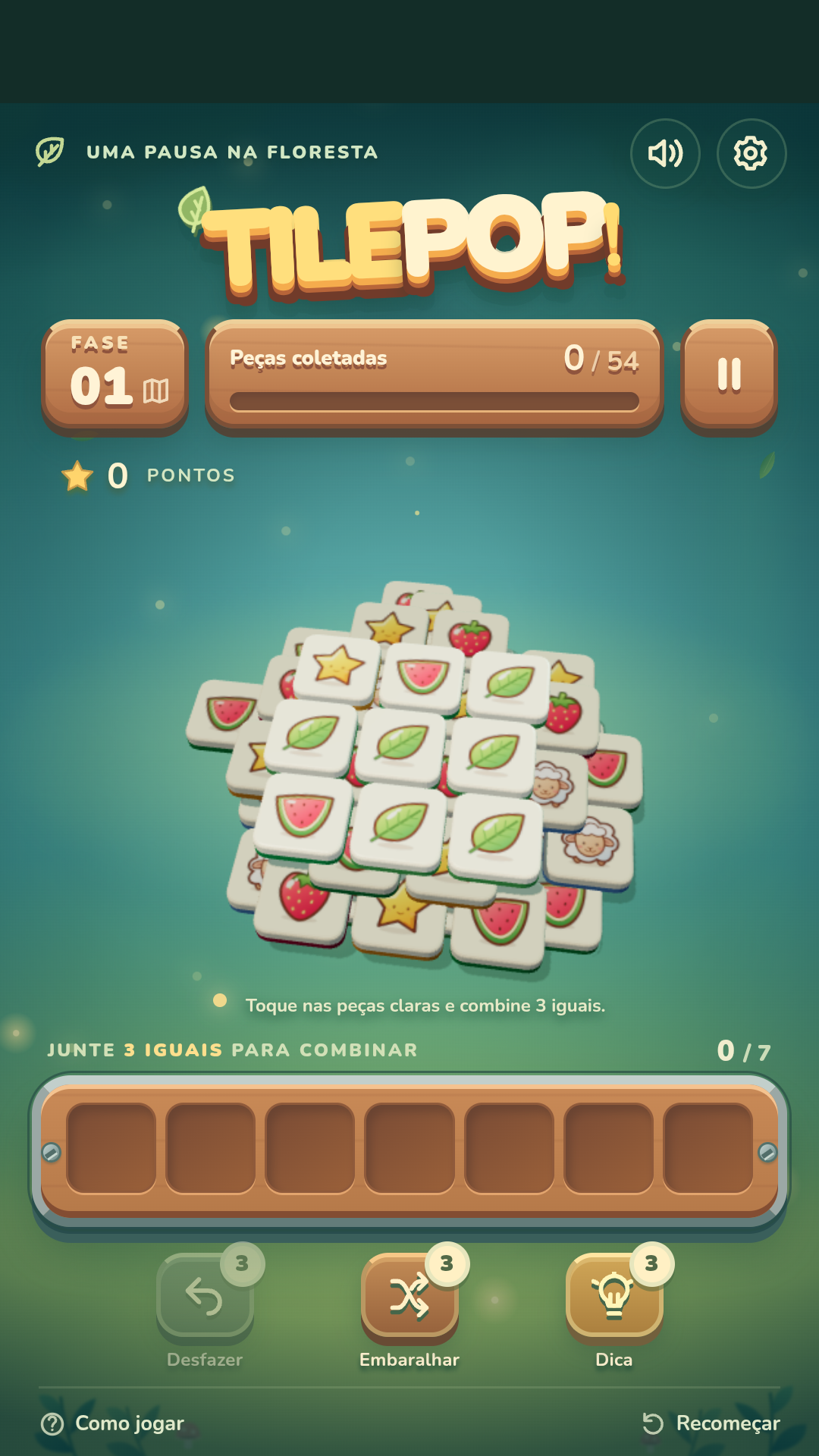 Primeira fase do TilePop com uma pilha de peças de frutas, folhas e estrelas e a bandeja vazia de sete espaços.